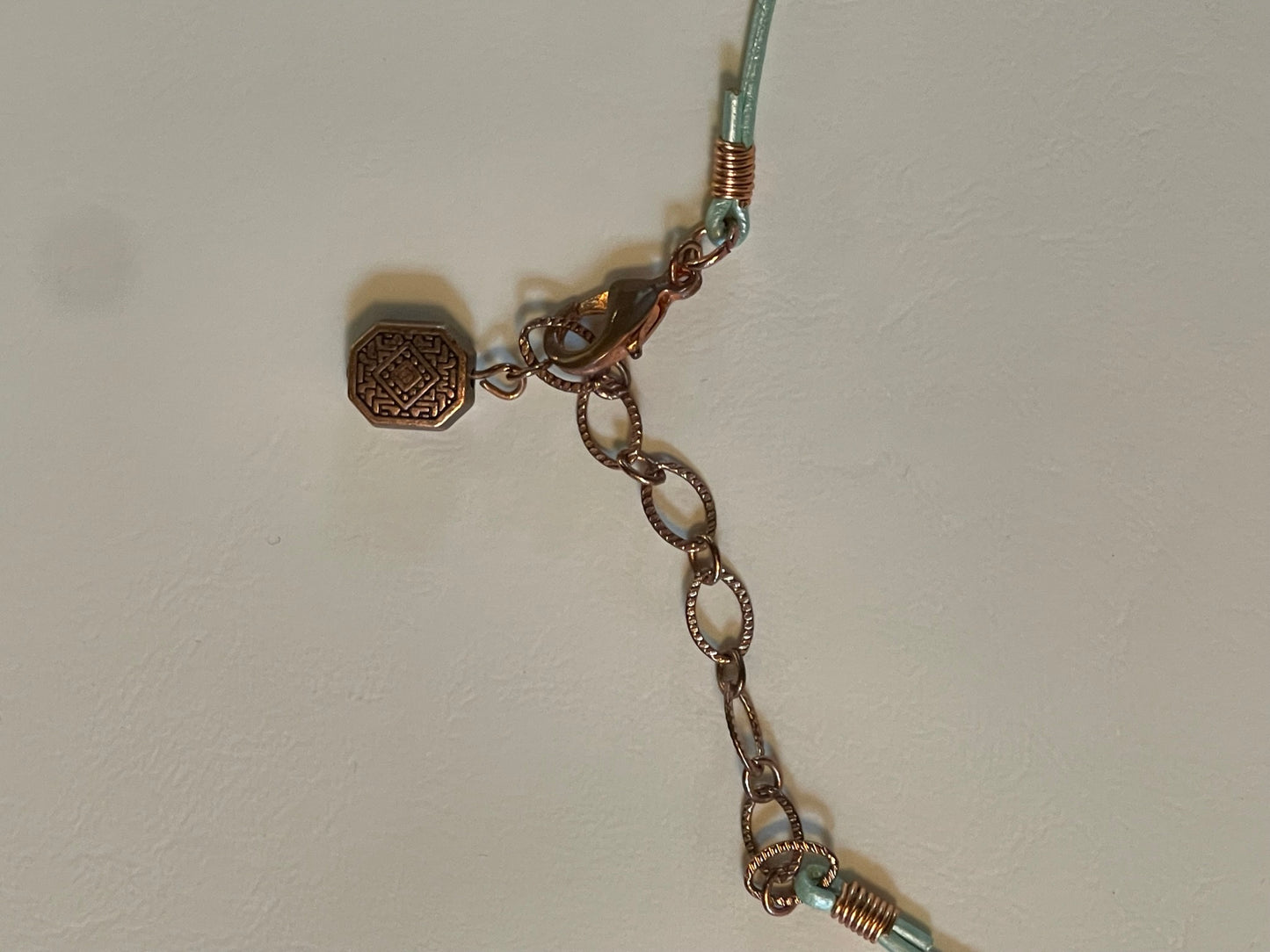 Wrapped Quartz Crystal on Aqua Leather with Glass Cane Bead